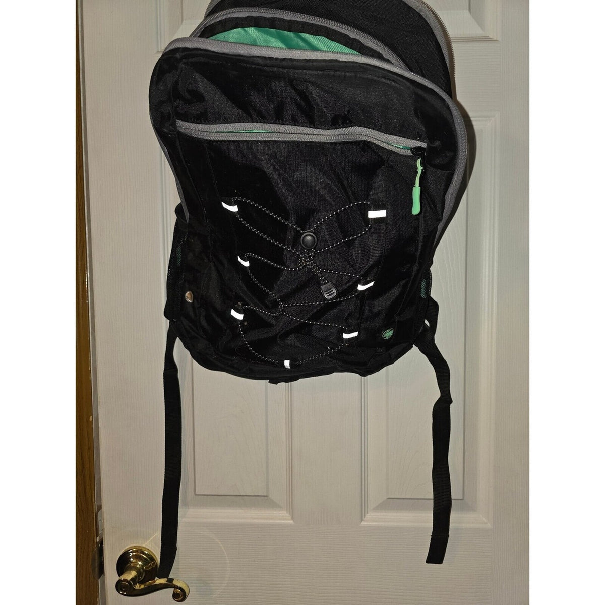 HP Black backpack with green lining