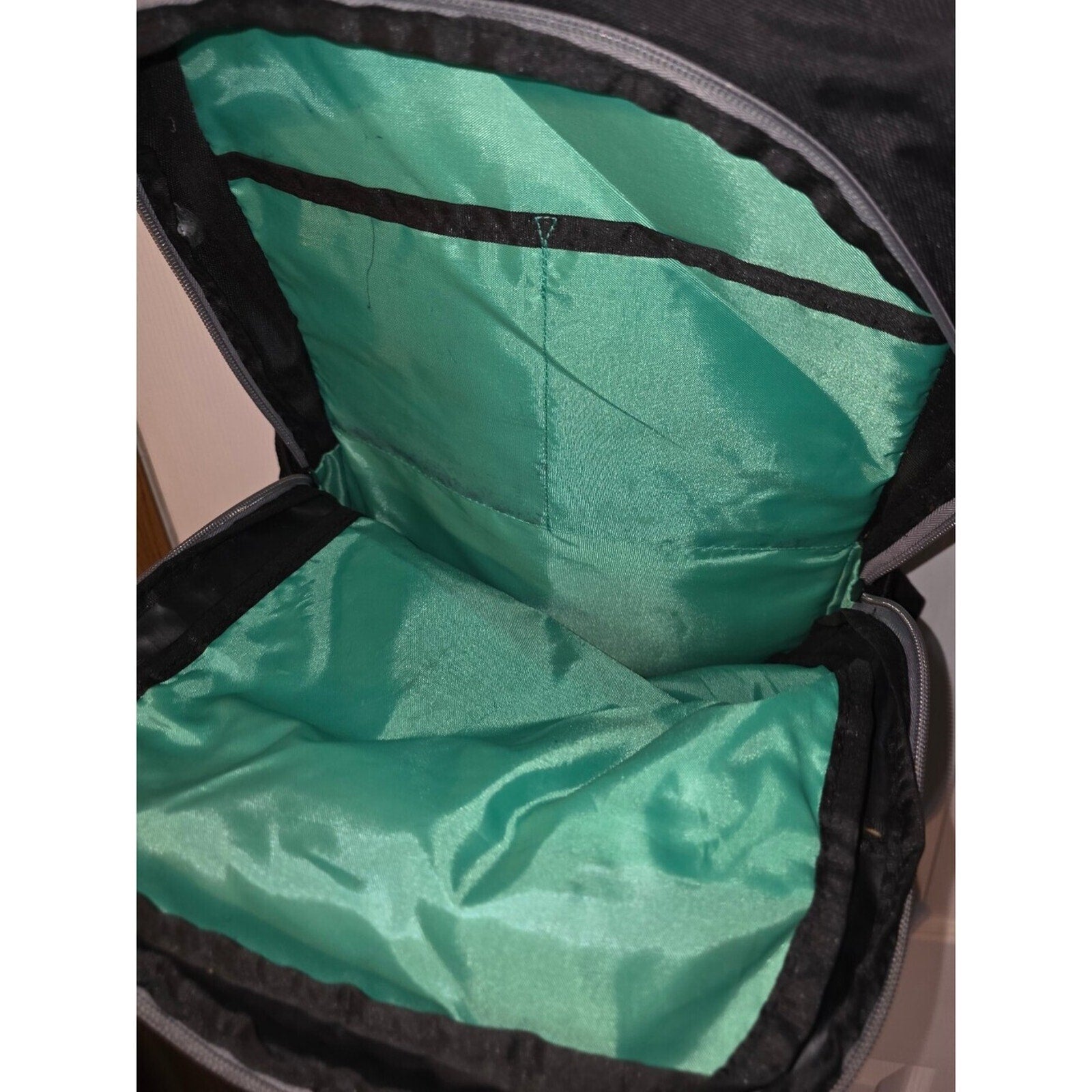 HP Black backpack with green lining