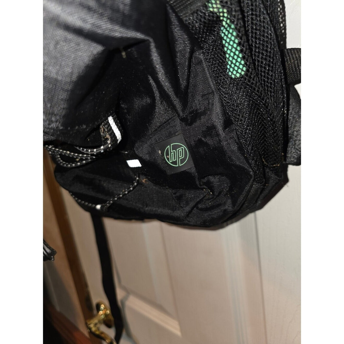 HP Black backpack with green lining