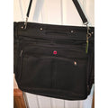 Black garment bag with shoulder strap
