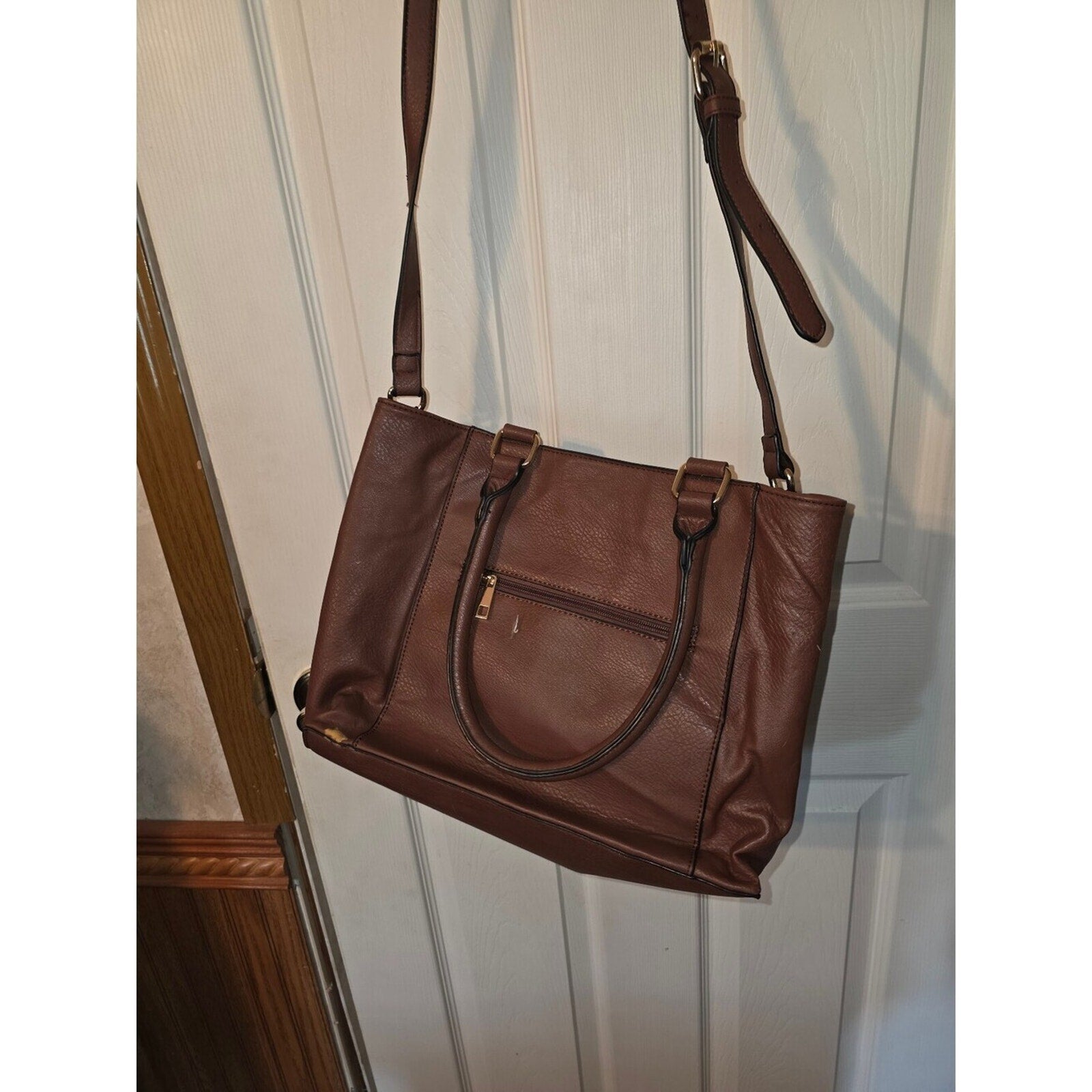 Brown studded tote bag