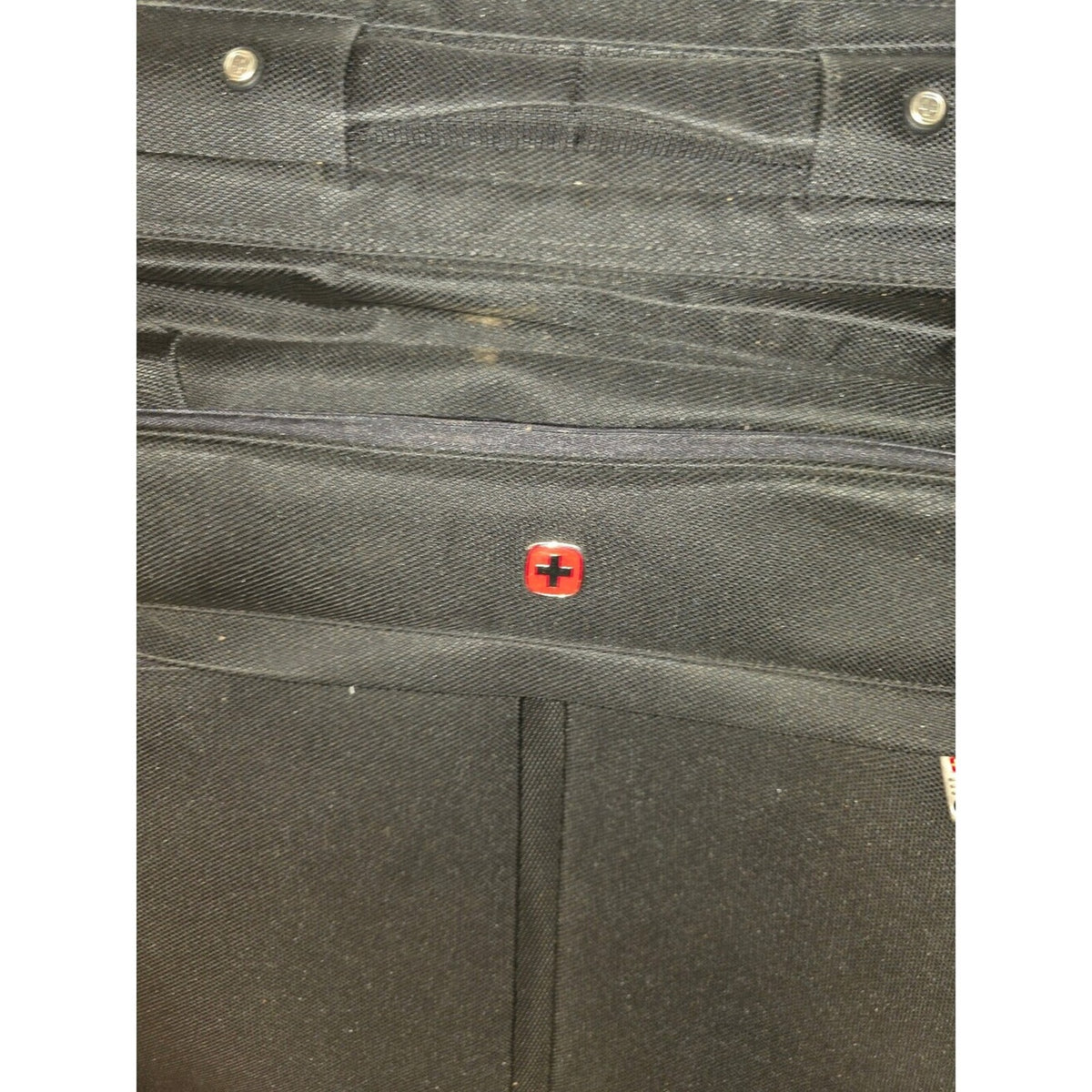 Black garment bag with shoulder strap